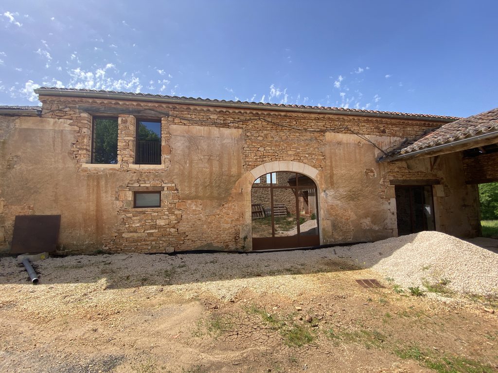 Façade en pierre de la grange réhabilitée – Lot